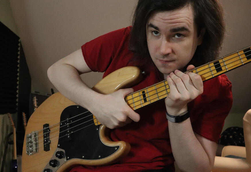 Chris holding a Bass