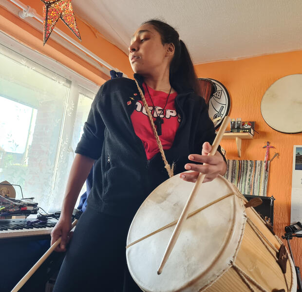 Annette holding a drum